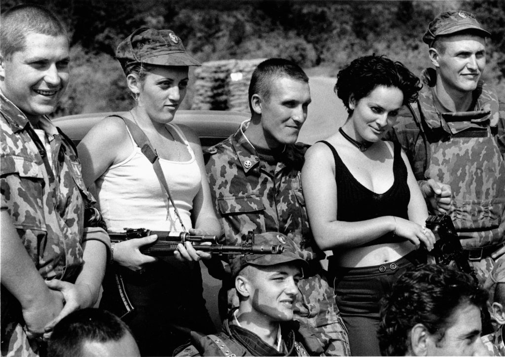 Russian soldiers with prostitutes. Mališevo, Kosovo, 2000