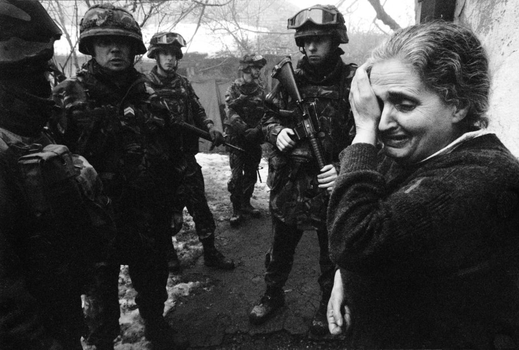 Serbian woman is afraid of Albanians who want to take her house. Mitrovica, Kosovo, 1999