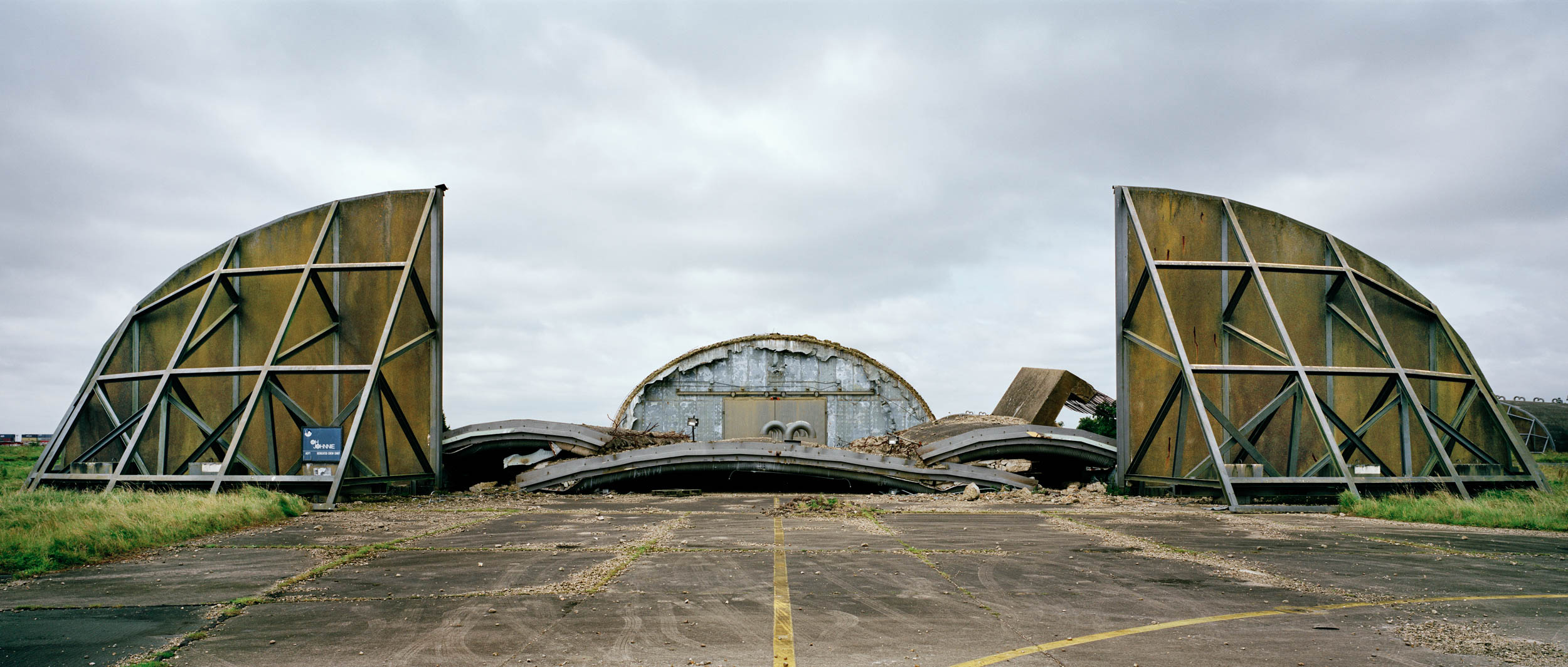 United Kingdom. Blown-up airplane shelter at a US Air Force base