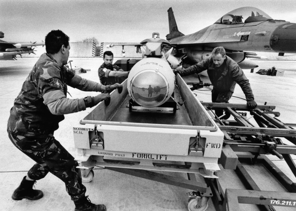 Second day of the Kosovo war. A Dutch fighter plane is being armed for a mission to Serbia. Amendola, Italy, 1999.